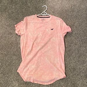 Medium pink Hollister curved hem t-shirt.